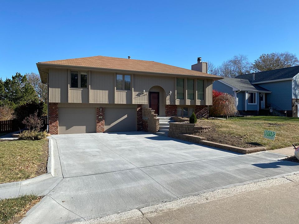 2905 s 159th Circle, New driveway, retaining wall and outside paint