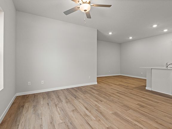 The family room is open to the family room and dining room.