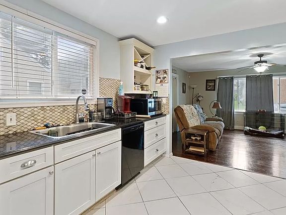 Peek out the window as you wash dishes, and enjoy the natural light that pours in!