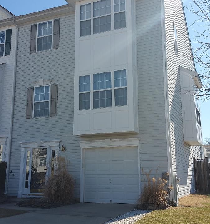 Exterior, Front. 1.5-car Garage, Fenced in BY and Deck