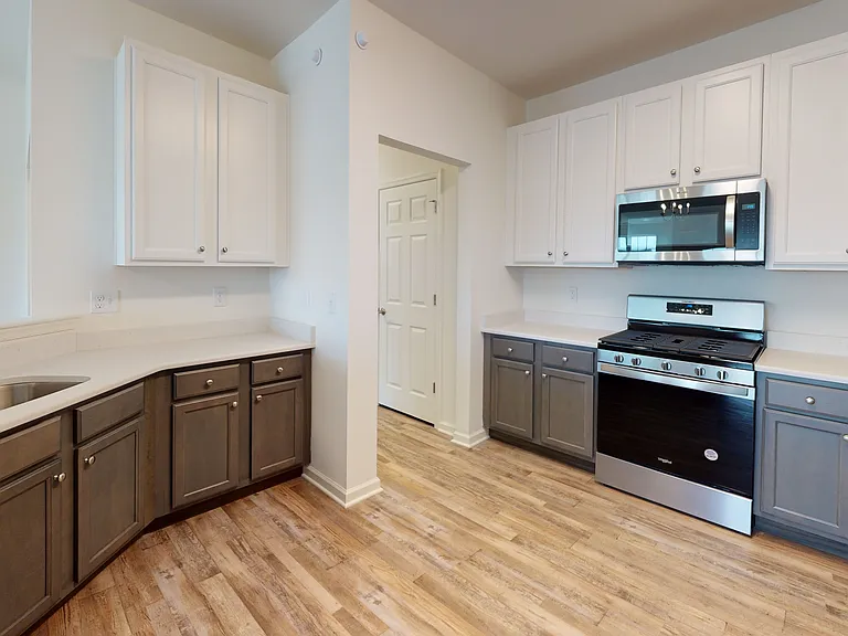 Welcome to Eastampton Village Center! This beautifully designed kitchen features modern appliances, ample storage, and stylish finishes. Perfect for culinary enthusiasts and home gatherings. Schedule your tour today and envision your new lifestyle!