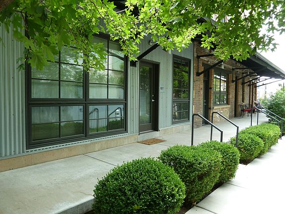 Front of unit with outdoor seating area