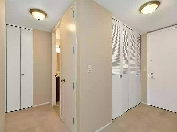 Foyer and hall to bedroom and bathroom