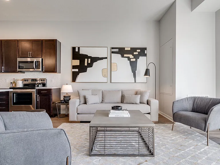 Unwind in your warm, welcoming living space with modern finishes.