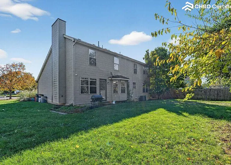 Angle showing the side and back of house
