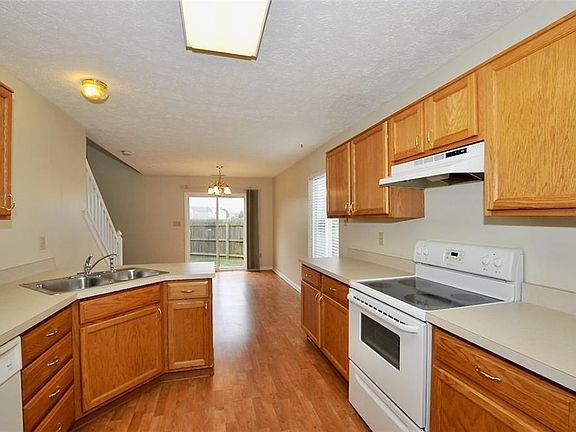 Kitchen entry from garage through laundry room.