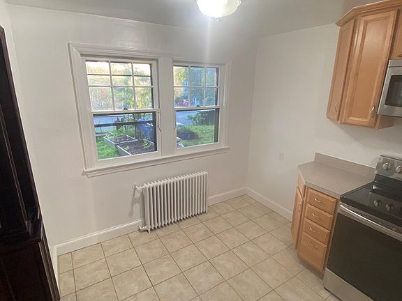 Kitchen with stainless steel appliances.