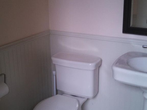 Half bath on main, off of the kitchen with quick access to backyard.
