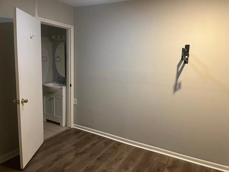 Bedroom with bathroom entry