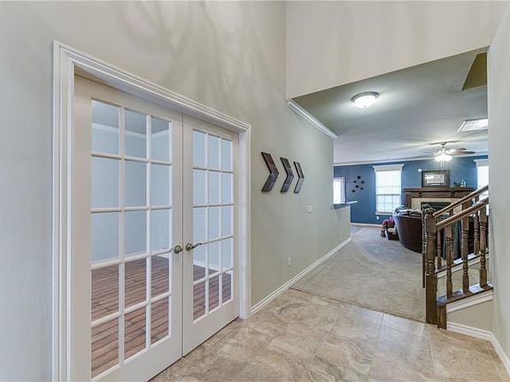 Looking into french doors of study.