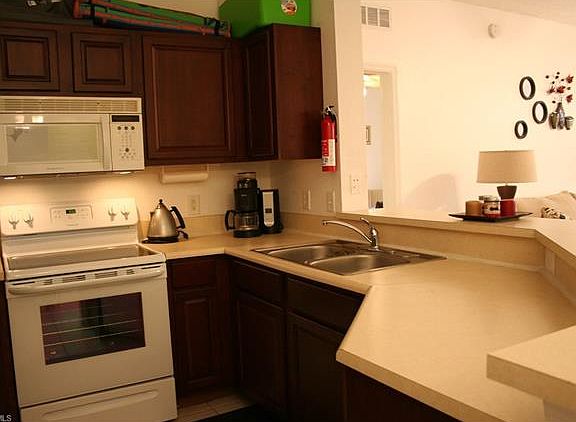 4th image of 15590 Ocean Walk Cir APT 210