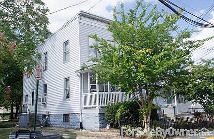 Front View 2
						:
						South side of house, and driveway.