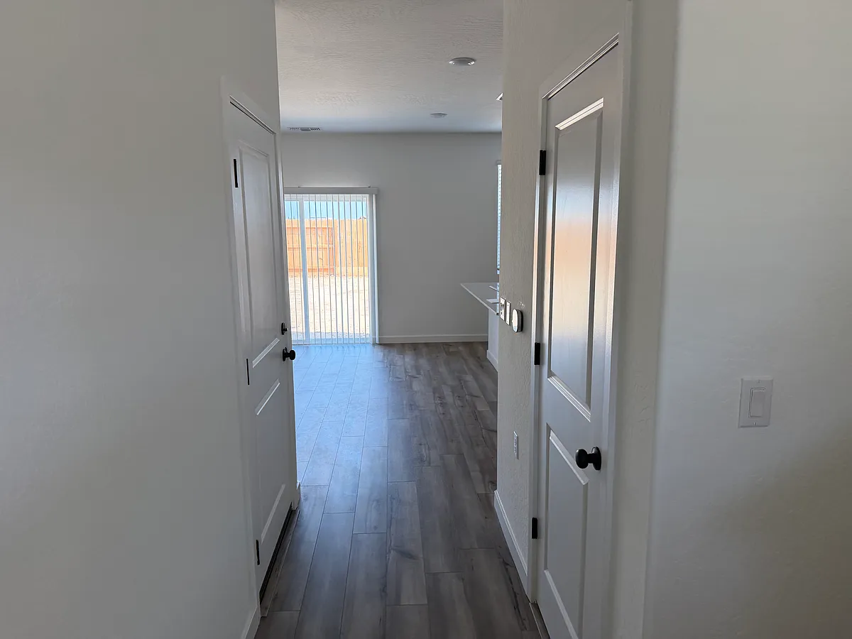 Hall to living room and kitchen - 4014 Clary Ct