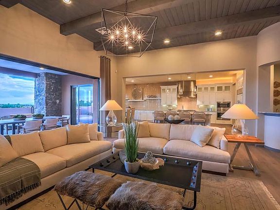 Gathering room opens to the large covered patio through the center sliding glass door for parties in