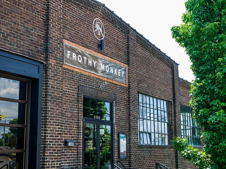 Grab your morning brew or unwind with wine at Frothy Monkey_just minutes from your front door at Modera Nations.