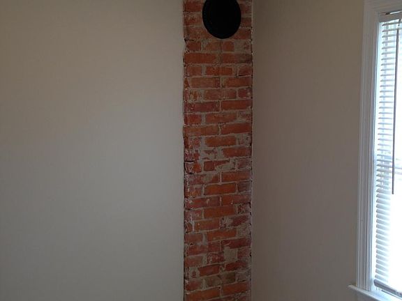 Exposed Brick Accent in Kitchen