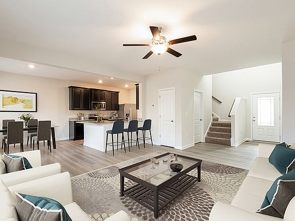 Enjoy open and spacious entertaining areas with upgraded finishes in the Chantilly by LGI Homes.