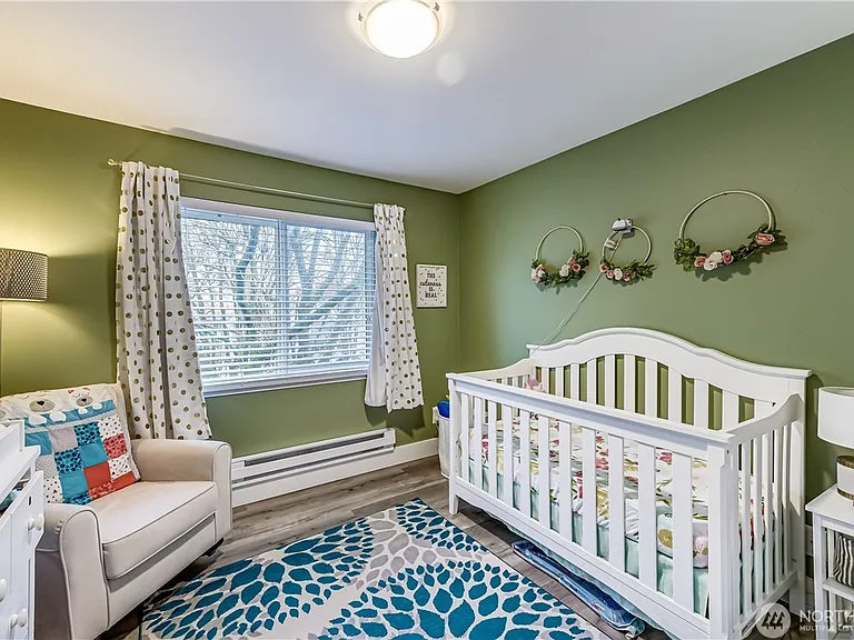 The guest room or second bedroom has a peaceful feel. It is nicely sized.
