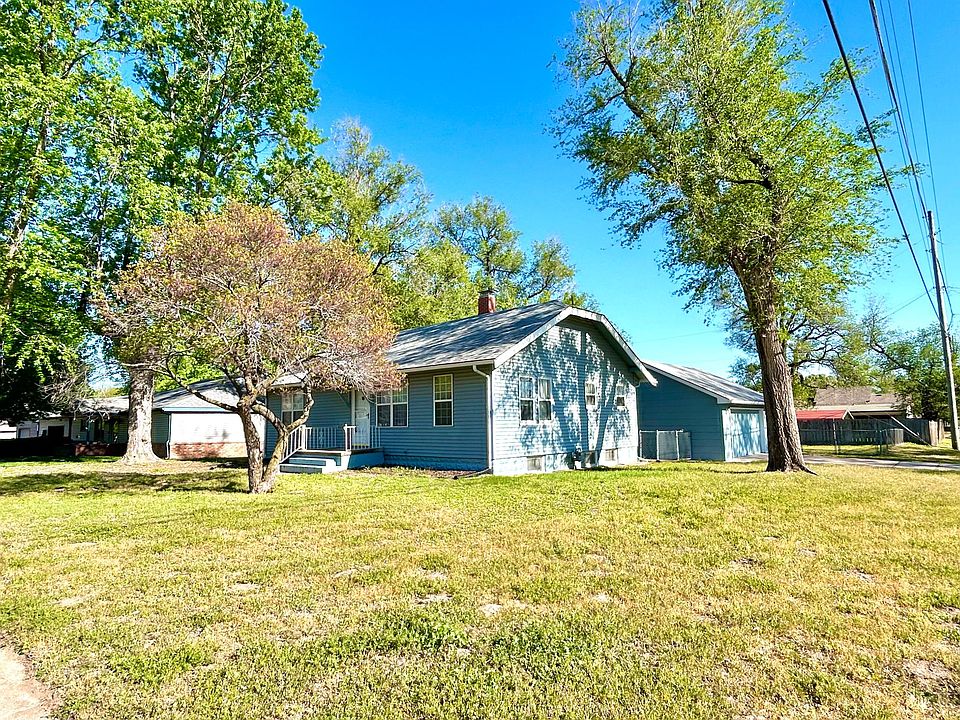 Corner lot with 2 car oversized detached garage.