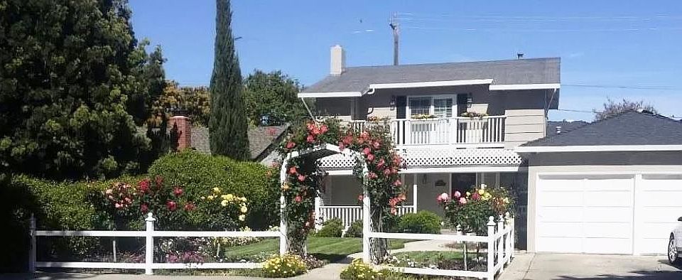 Front yard, gazebo and rose bushes