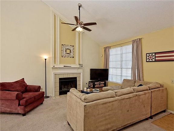 Wood/Gas fireplace with beautiful accent paint color.