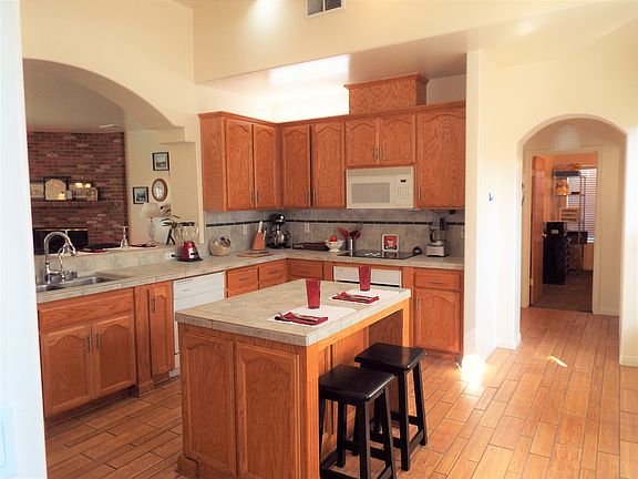 Kitchen w view to 4th BR