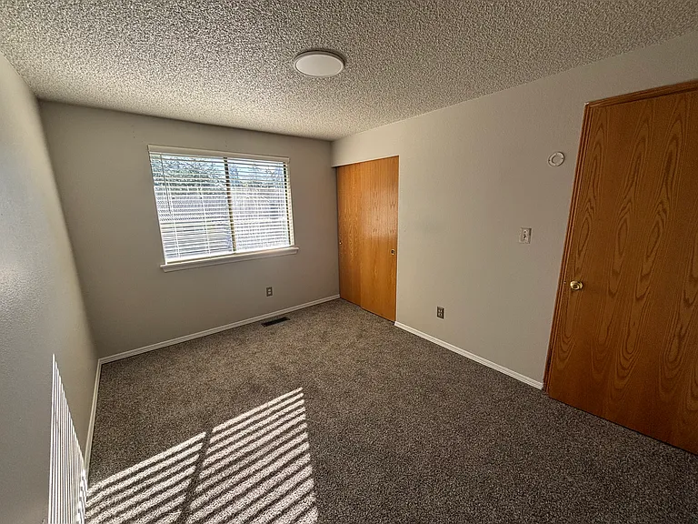 Spacious secondary bedroom with great natural light due to it's southern exposure