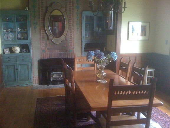 Dining Room shows 1 of 3 fireplaces