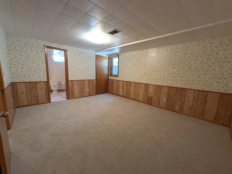 Basement bedroom with en suite bathroom