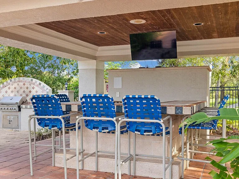 Unwind in our stunning cabana area, where relaxation meets entertainment! Enjoy bar seating, catch the game on the outdoor TV, or fire up the gas grill for a perfect cookout.