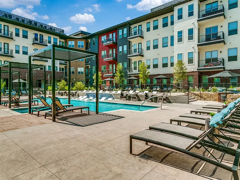 Resort-style pool with expansive sundeck