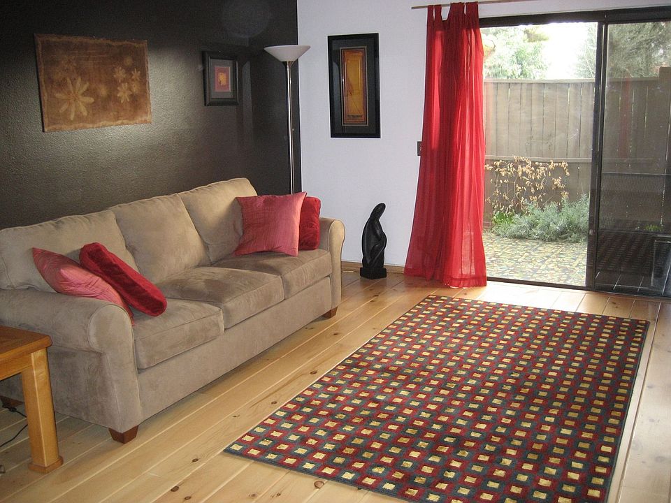 living room with beautiful wood floors and lots of light