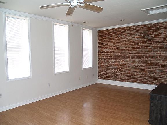 Living room with exposed brick
