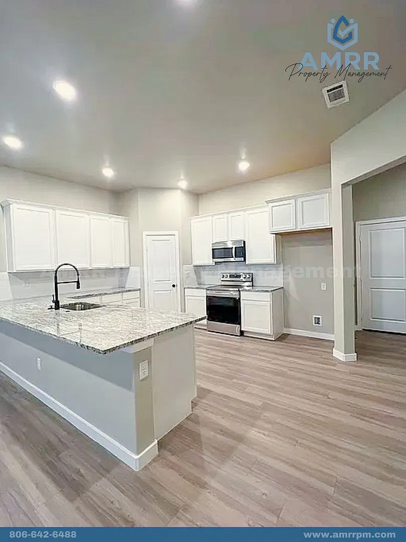 New Beginnings Start with AMRR: Spacious 3-Bedroom Home Your Perfect Family Home! — Photo 4