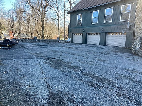 3 car garage & parking space