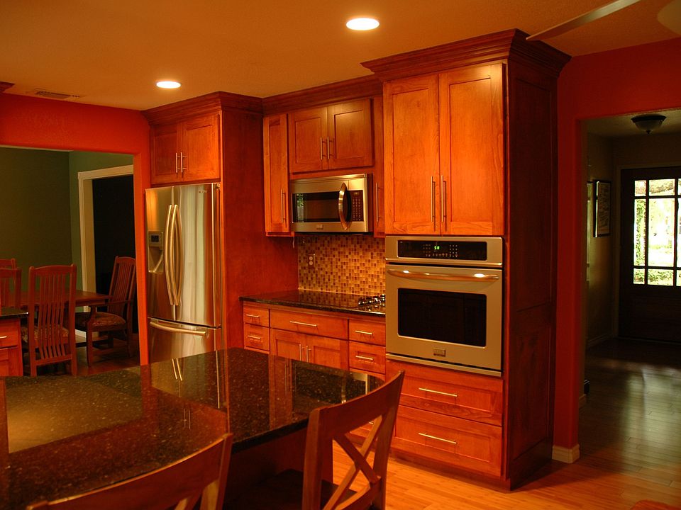 Kitchen fully remodeled with new stainless appliances, granite, wood floors.