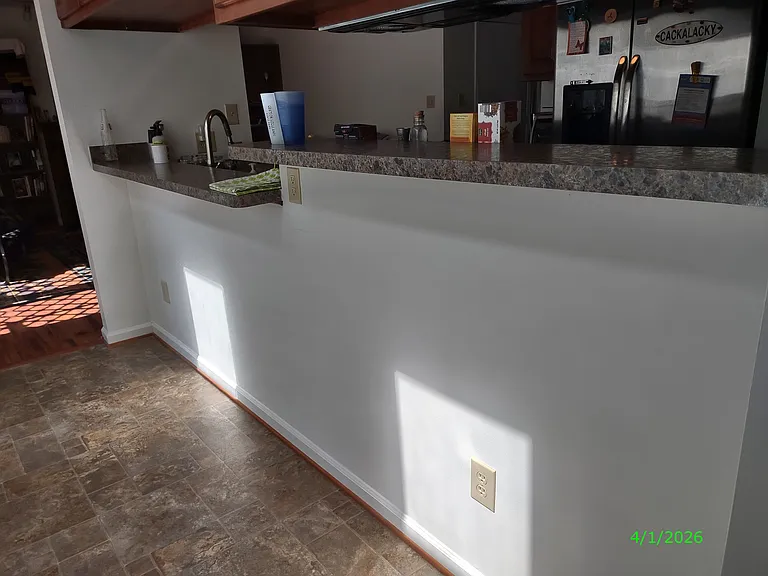 This photo has not been altered in any way: no edits or filters have been applied to try to deceive the viewer by having the room appear larger or brighter than it actually is.