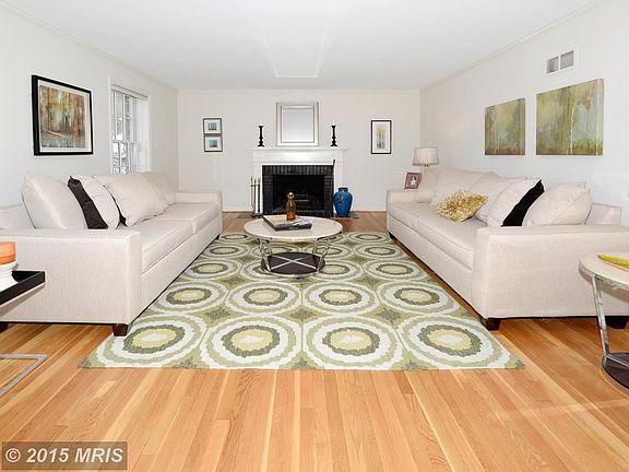 Straight on shot of living room with fireplace