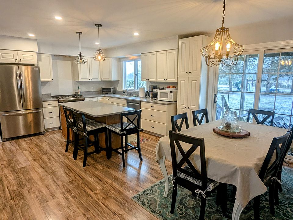 Open floor plan view of kitchen and dining room.