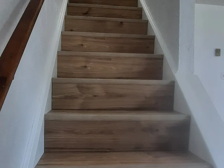 brand new flooring on stairs and fresh paint throughout
