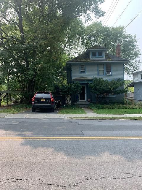 Exterior of 1007 E State St Ithaca NY Long Driveway for 2 Cars