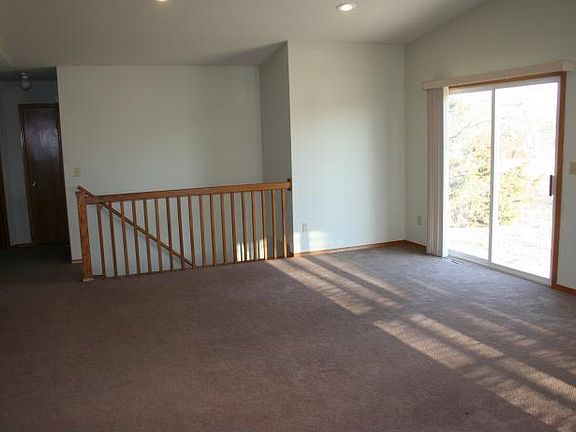 Living room dining area and patio door.
