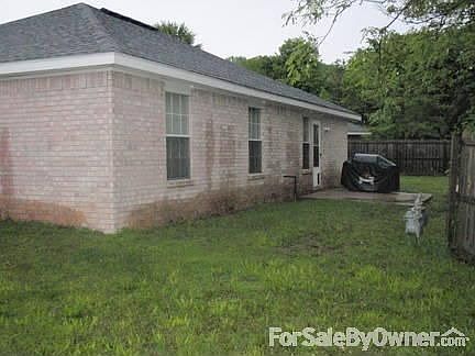 Back yard
						:
						Large privacy fence yard, Small patio, Backs up to a fayetteville green space.
