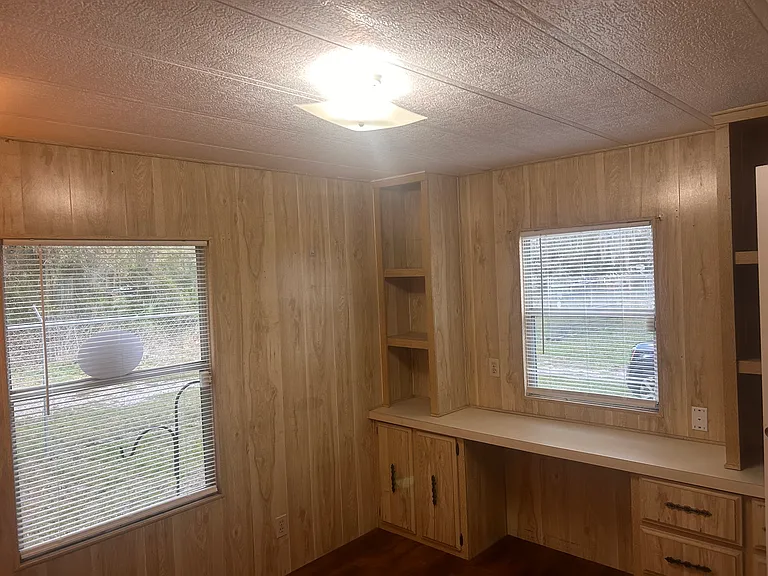 Second bedroom with shelf/drawer built in storage