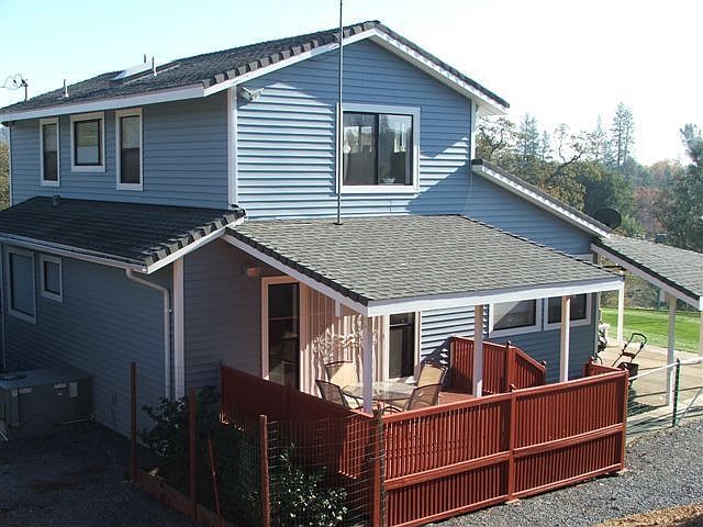 Wonderful covered back porch off master bedroom