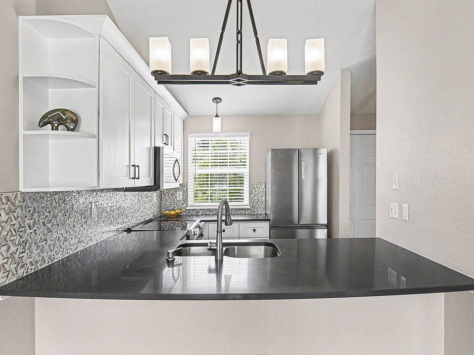 Remodeled kitchen with breakfast bar counter seating