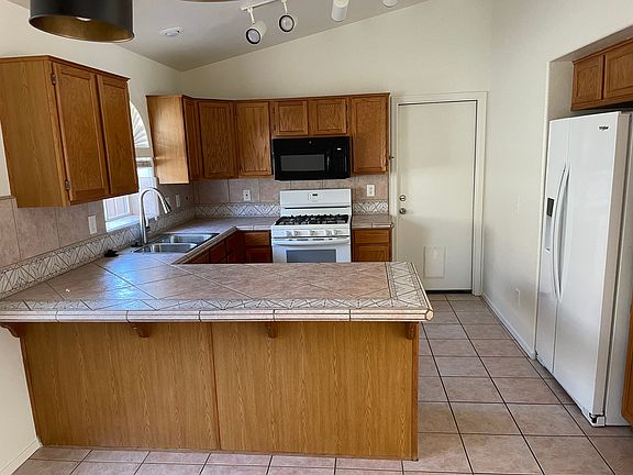 Kitchen with Custom Tile Counter, New Sink & Faucet, New Window Covering