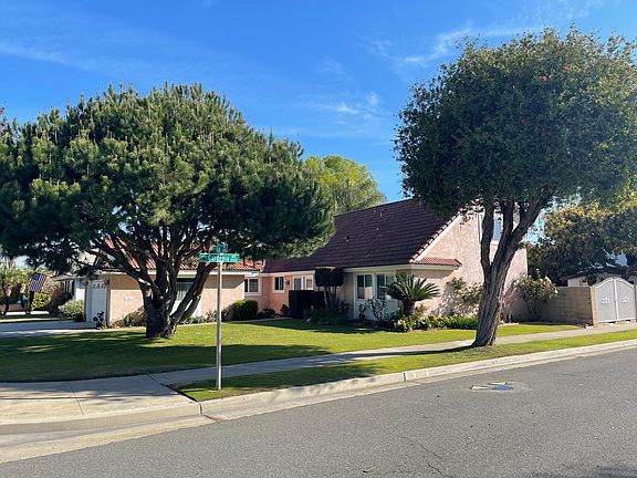 Corner lot with RV access to back yard behind security gates