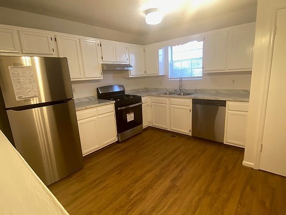 Kitchen with new stainless steel appliances
