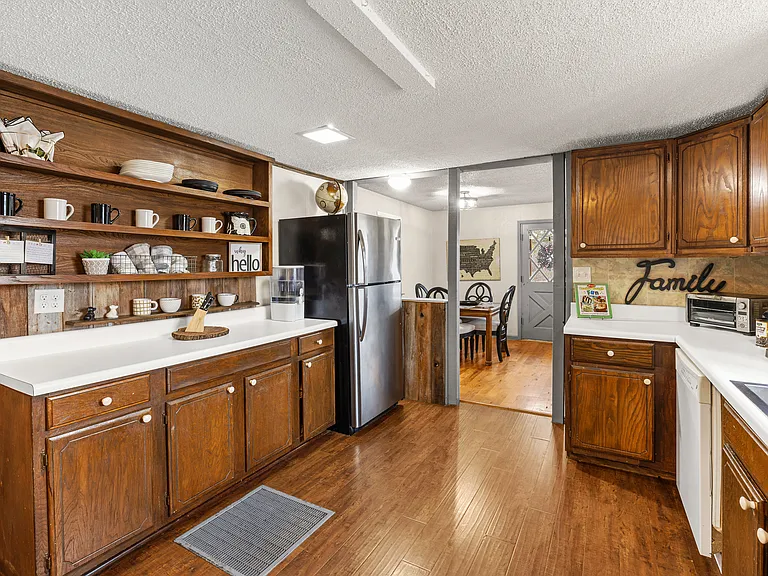 Kitchen open to living and dining areas